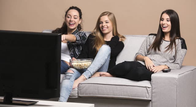 friends laughing watching tv